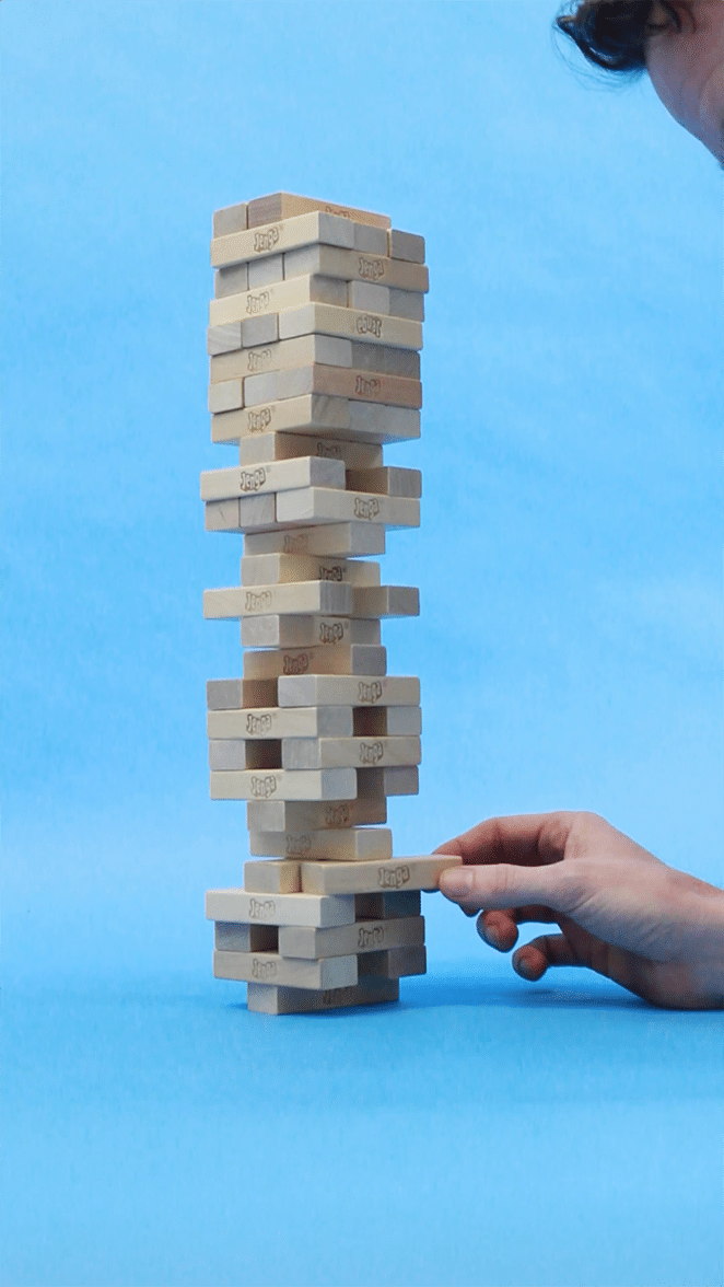 diseño por volante cinemagraph photoshop cómo tutorial hombre sacudiendo la torre jenga