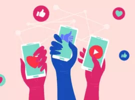 Hände, die Smartphones mit Symbolen für soziale Netzwerk-Apps halten, die Beispiele für den sozialen Handel darstellen.