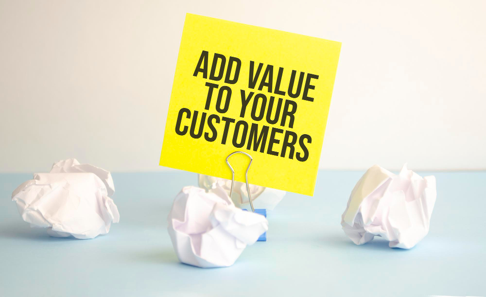 Notizbuch mit Text Mehrwert für Ihre Kunden